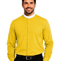 Man wearing a yellow long-sleeve clerical shirt with a white collar on a white background
