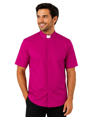 Man wearing a bright pink clerical shirt with a white collar on a white background