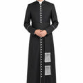 Man wearing a long black robe with white buttons on a white background