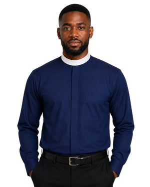 A man wearing a navy blue long-sleeve clerical shirt with a white collar, paired with black trousers and a black belt, photographed against a solid white background.