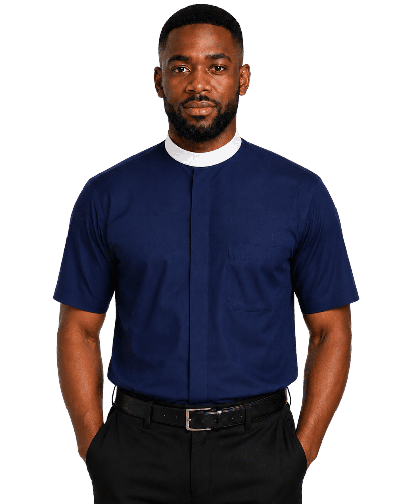 A man wearing a navy blue short-sleeve clerical shirt with a white collar, paired with black trousers and a black belt, photographed against a solid white background.
