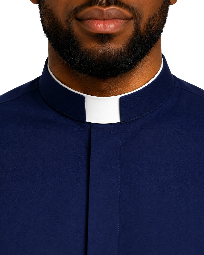 Close-up of a man wearing a navy blue clerical shirt with a white collar, cropped from the lower face to the chest against a plain white background.