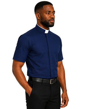A man wearing a navy blue short-sleeve clerical shirt with a white collar, paired with black trousers and a black belt, shown against a plain white background.