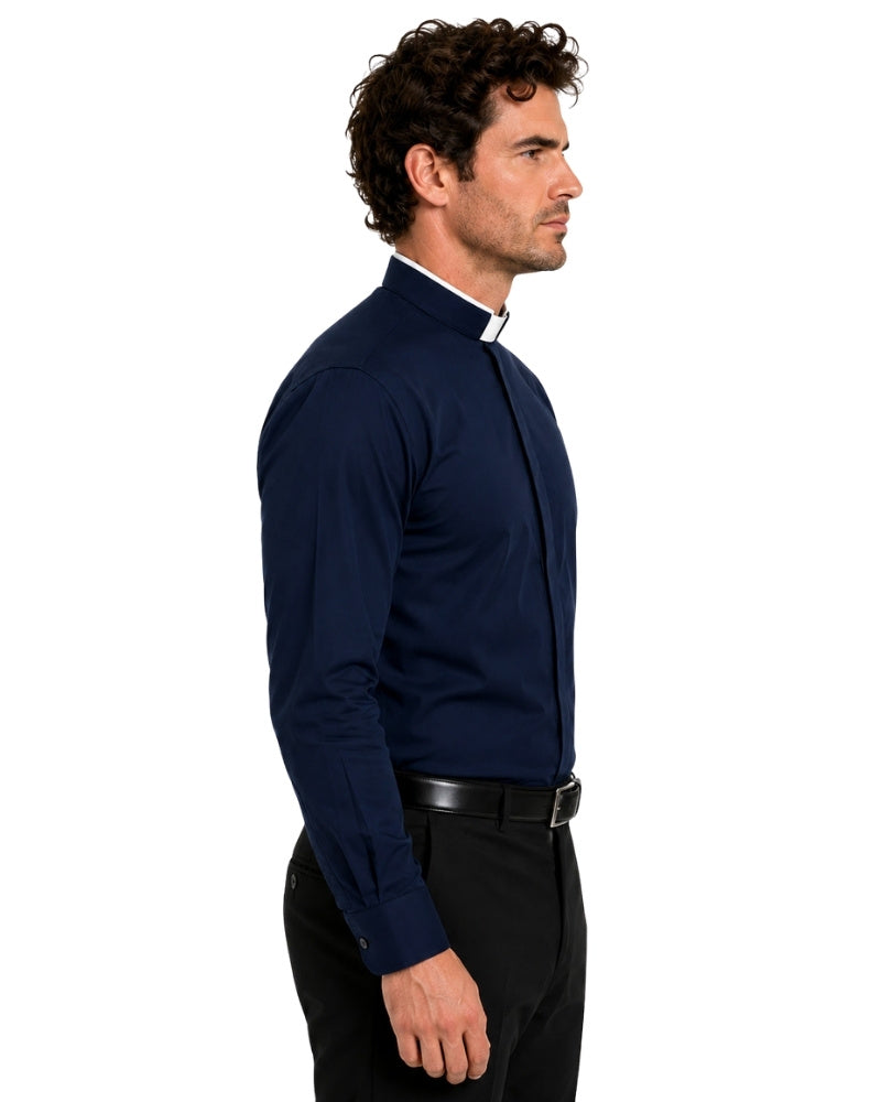 Man wearing a navy blue clerical shirt with a white collar on a white background