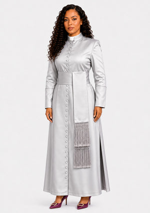 Woman wearing a long light gray robe with a fringed detail on a white background