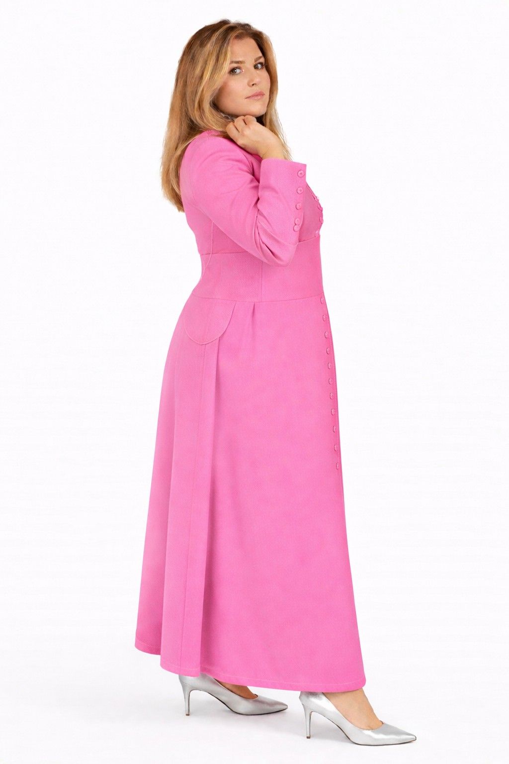 Woman wearing a pink robe on a white background