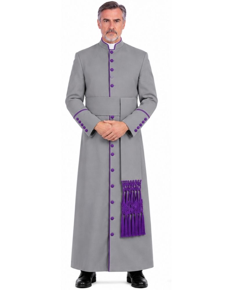 A man modeling a Purple Abdiel Clergy Cassock, purple buttons, and a matching purple sash, standing against a plain white background.