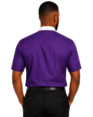 A man viewed from the back wearing a purple short-sleeve clerical shirt over a white collared undershirt, paired with black trousers and a black belt, against a plain white background.