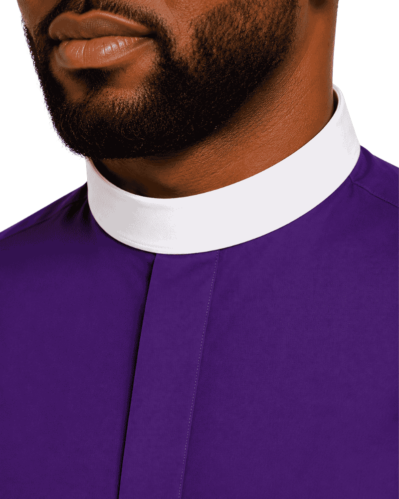 Close-up of a man wearing a purple clerical shirt with a white collar, showing the lower face, beard, neck, and upper chest against a plain white background.