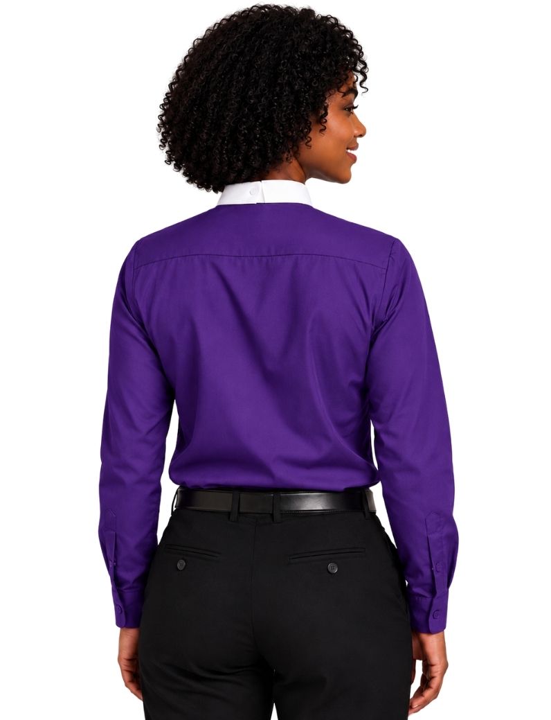 A woman shown from the back wearing a purple long-sleeve clerical shirt with a white collar, paired with black trousers and a black belt, against a plain white background.