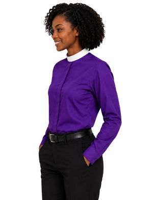 A woman wearing a purple long-sleeve clerical shirt with a white inner collar, paired with black pants and a black belt, shown against a plain white background.