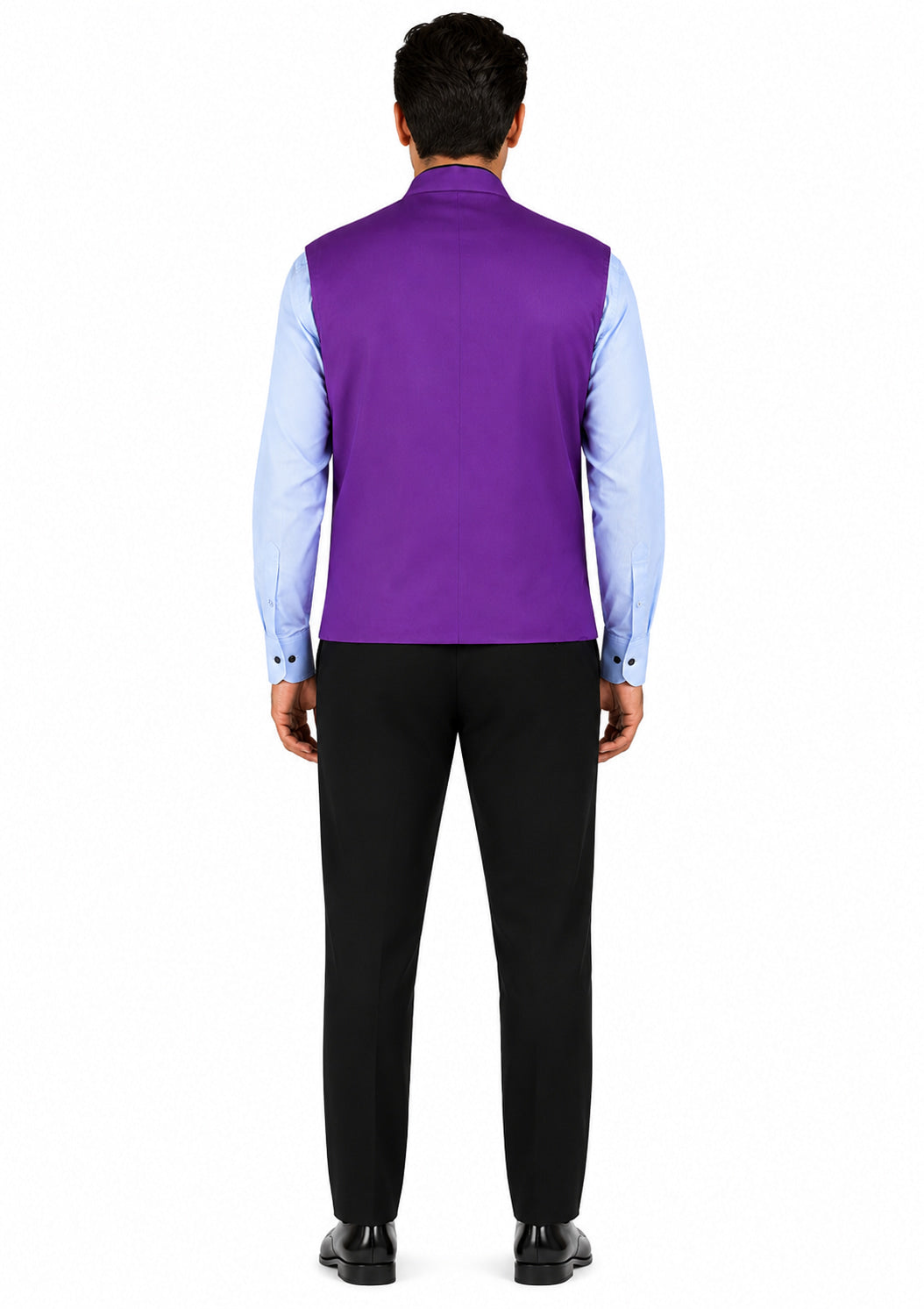 Man wearing a purple vest over a light blue shirt with black pants on a white background