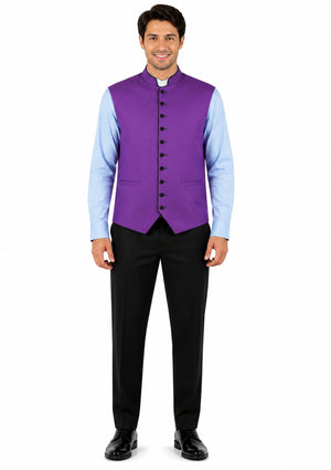 Man wearing a purple vest over a light blue shirt with black pants on a white background