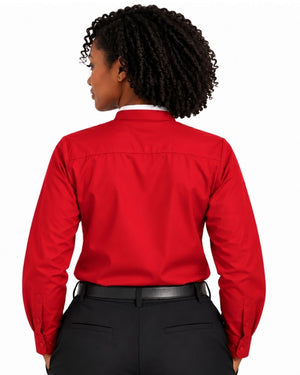 A woman shown from the back wearing a long-sleeve red clerical shirt tucked into black pants, against a plain white background.
