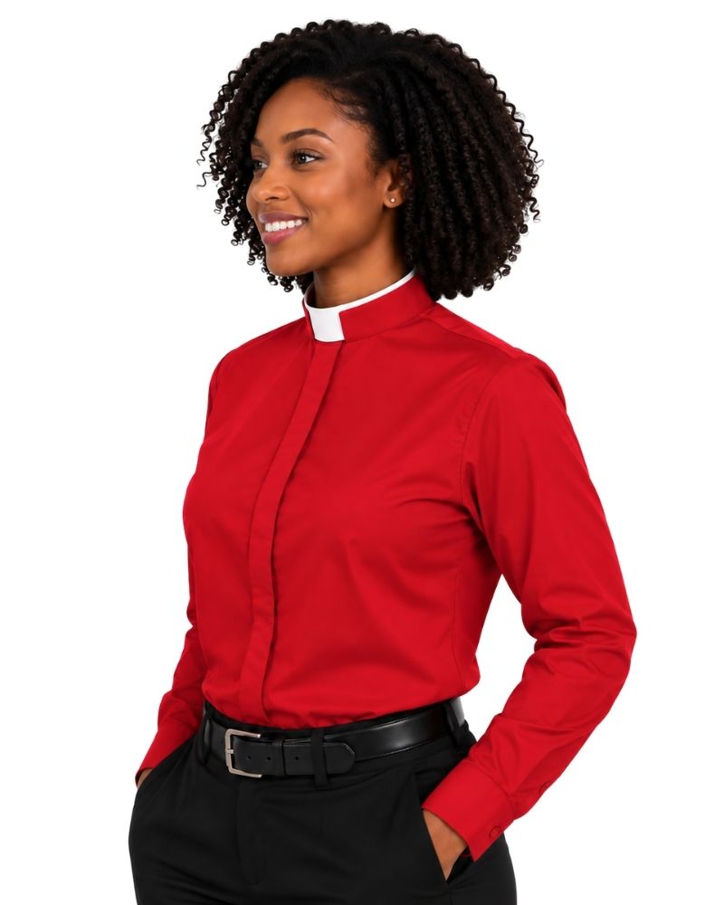 A woman wearing a red long-sleeve clerical shirt with a white collar, paired with black trousers and a black belt, shown against a plain white background.