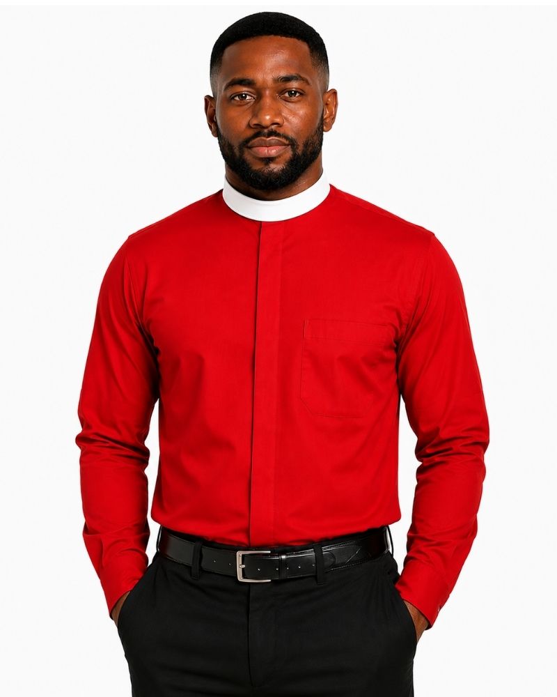A man wearing a vibrant red long-sleeve clerical shirt with a contrasting white mock neck collar, paired with black trousers and a black belt, set against a plain white background.