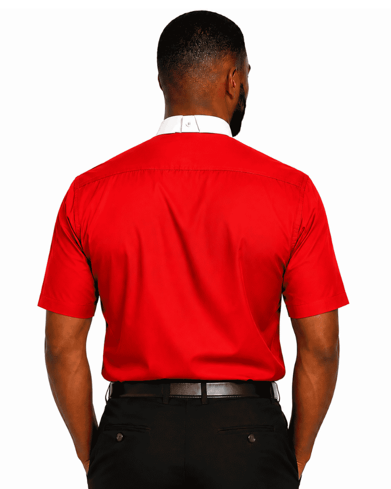A man viewed from the back wearing a bright red short-sleeve clerical shirt with a white collar, paired with black trousers and a black belt, against a plain white background.