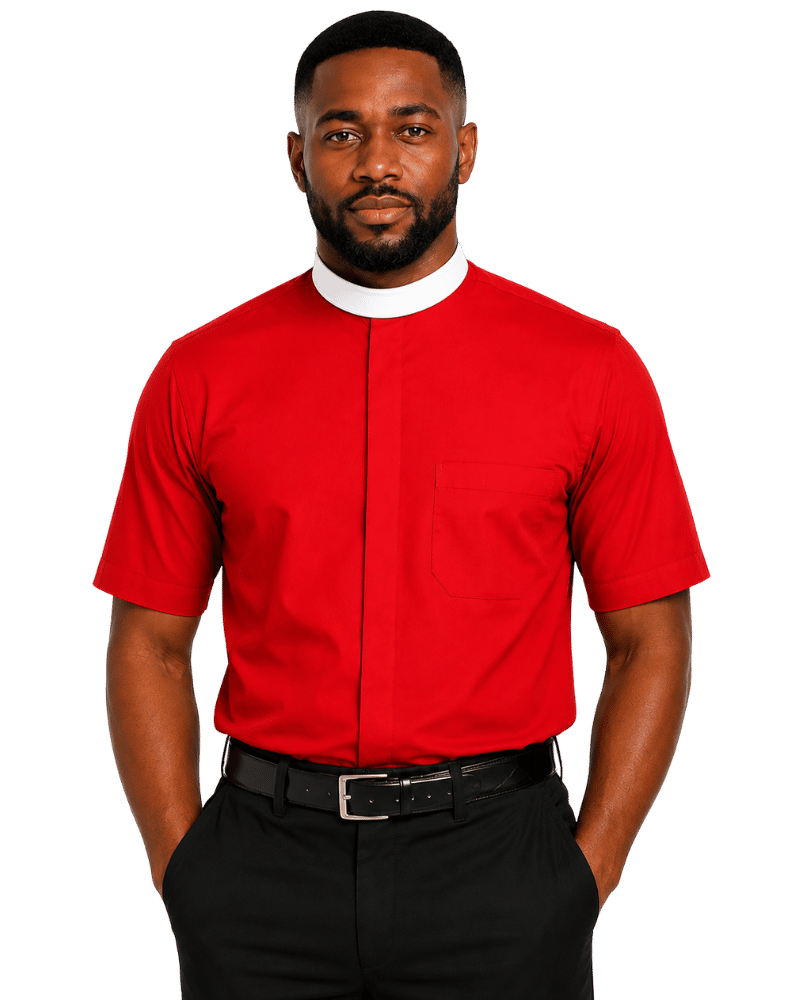 A man wearing a bright red short-sleeve clerical shirt with a chest pocket, paired with black trousers and a black belt, photographed against a plain white background.