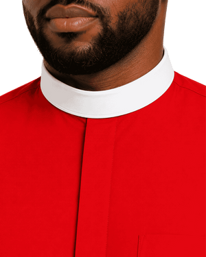 Close-up of a man wearing a bright red clerical shirt with a contrasting white high collar.