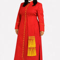 Woman wearing a red robe with yellow accents on a white background