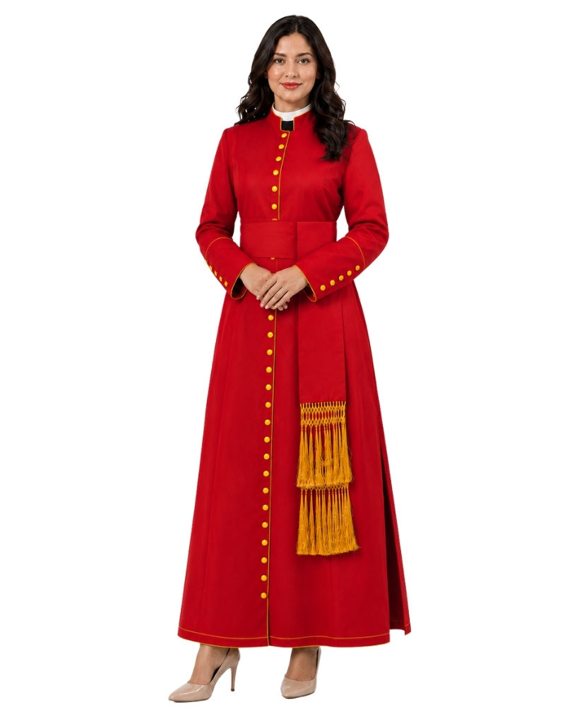 A woman modeling a long red cassock with gold buttons, gold fringe, and a white collar, standing against a plain white background.