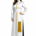 Woman wearing a white robe with yellow accents on a white background