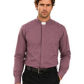 Man wearing a purple clerical shirt with a white collar on a white background