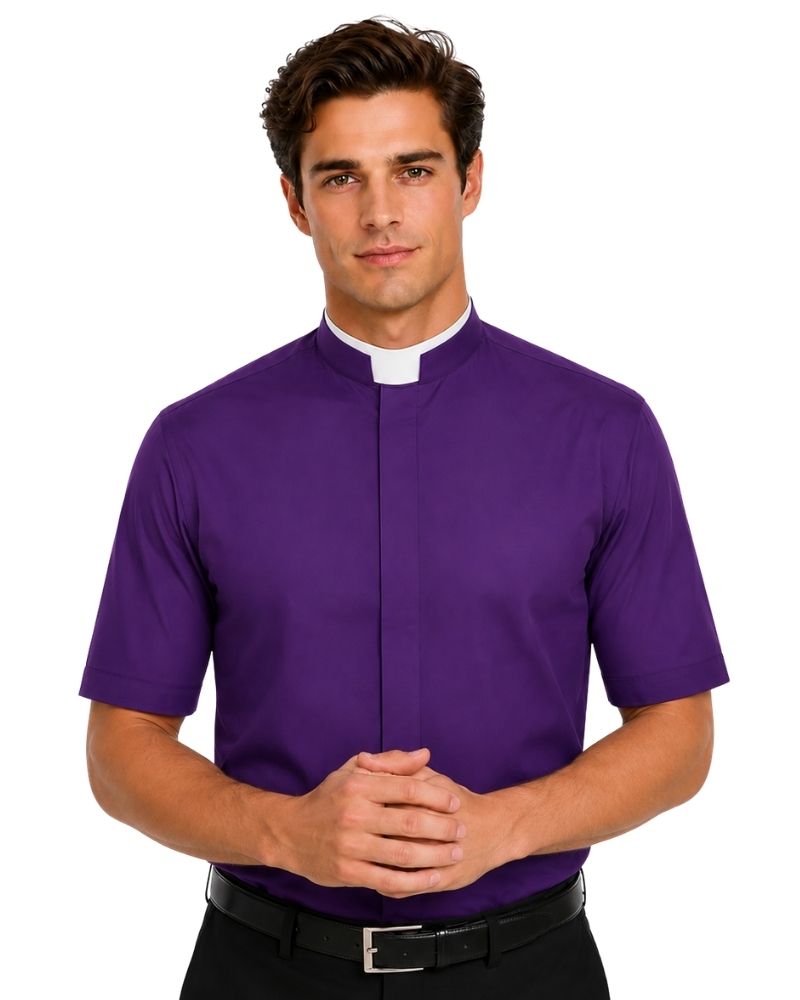 A man wearing a purple short-sleeve clerical shirt with a white collar, paired with a black belt and black trousers, photographed against a solid white background.