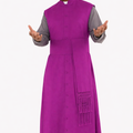 Man wearing a purple cassock on a white background