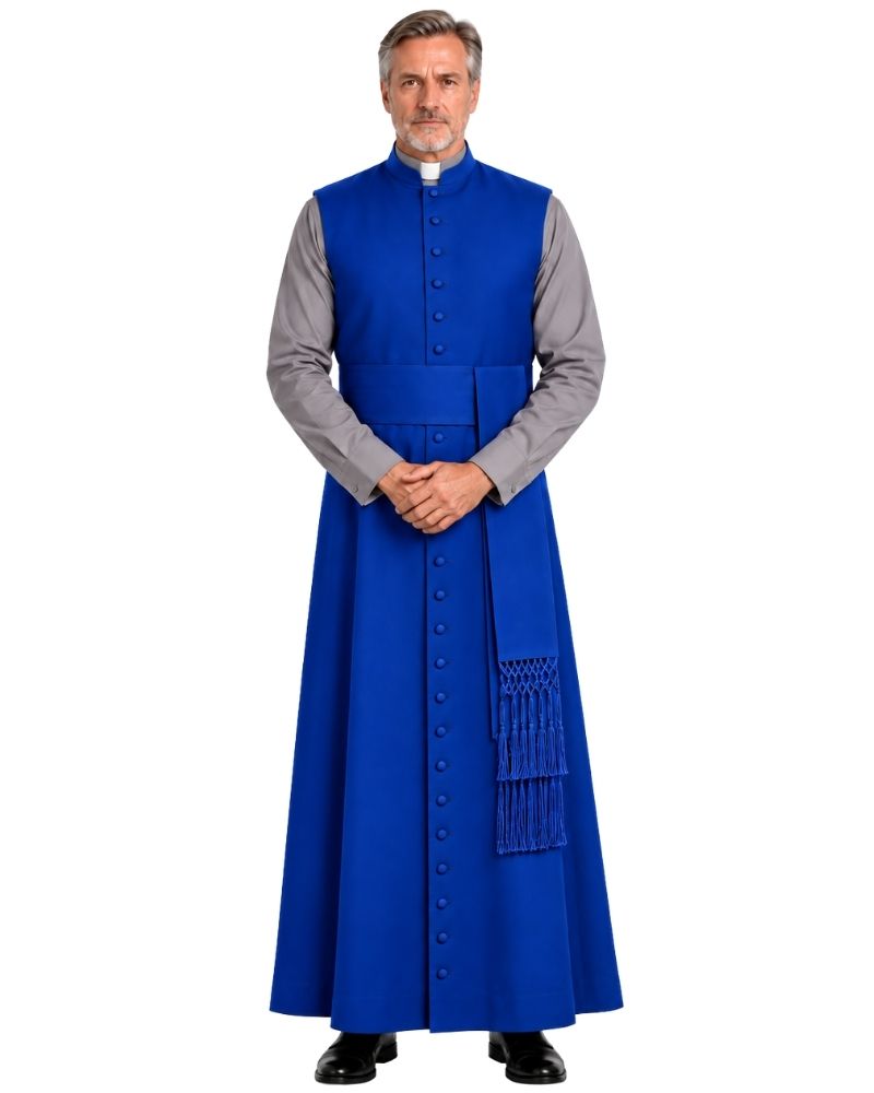 A man modeling a Royal Blue Jethro Sleeveless Clergy Robe over a gray long-sleeve shirt and a white collar, standing against a plain white background.