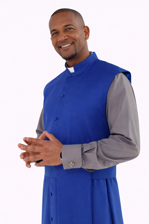 Man wearing a blue cassock with a gray shirt underneath on a white background