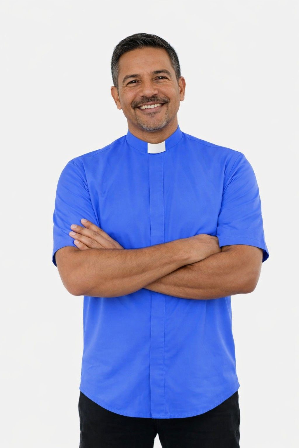 Man wearing a blue shirt with a white collar against a white background