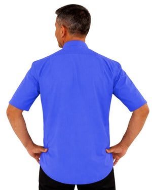 Man wearing a blue shirt with a white collar against a white background