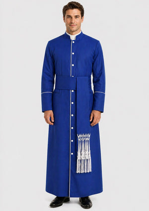 Man wearing a blue robe with white buttons and tassels on a plain background