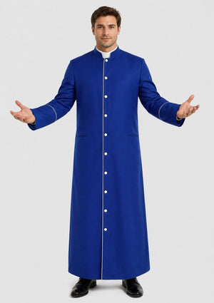 Man wearing a long blue robe with white buttons on a plain background