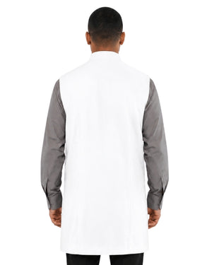 Man wearing a white vest over a gray long-sleeve shirt on a light white background.   