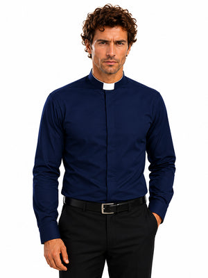 Man wearing a navy blue clerical shirt with a white collar on a white background