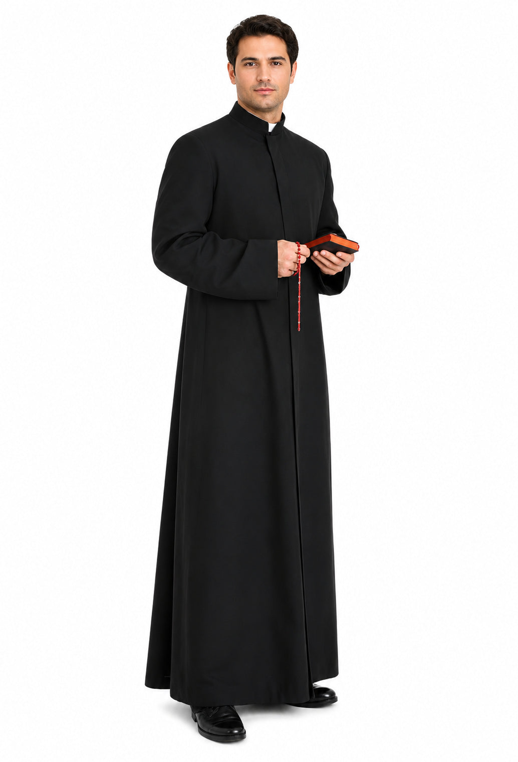 Man wearing a black priest's robe holding a book on a white background