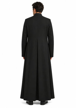 Man wearing a long black cassock on a white background