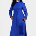 Woman wearing a blue dress with a matching robe on a white background
