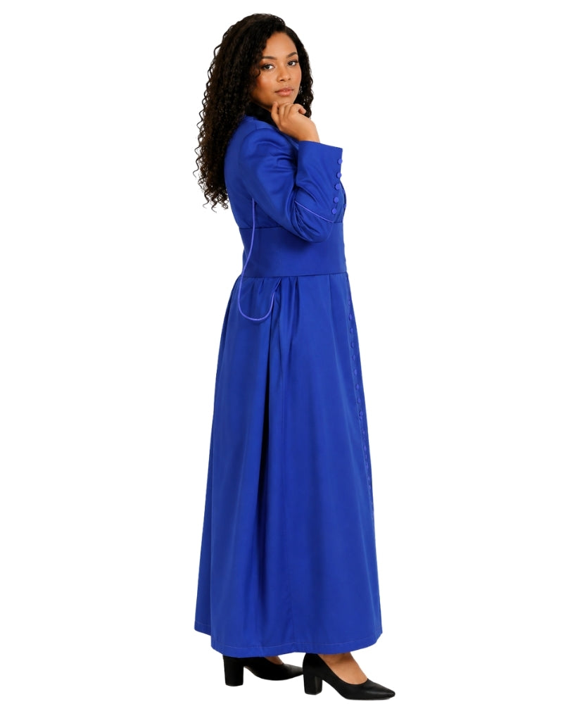 A woman modeling a long royal blue cassock with long sleeves, a defined waist, and a flowing skirt, shown against a plain white background.
