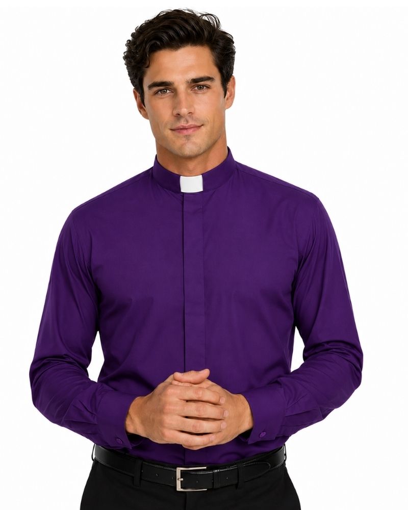 A man wearing a purple long-sleeve clerical shirt with a white collar tab, paired with a black belt and black trousers, standing against a plain white background.