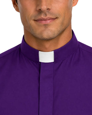 A close-up of a man wearing a purple clerical shirt with a white collar tab, shown from the lower face to the chest against a plain white background.