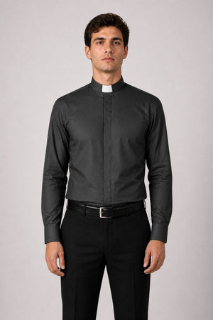 Man wearing a black clerical shirt with a white collar on a gray background