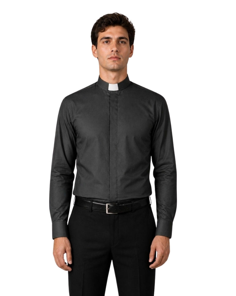 Man wearing a black clerical shirt with a white collar on a white background