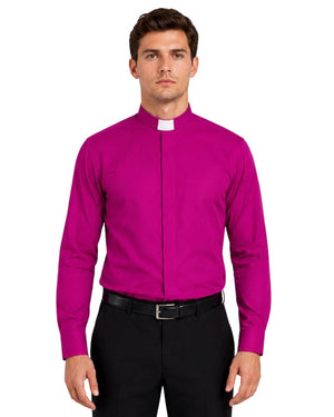 Man wearing a bright pink shirt and black pants on a white background