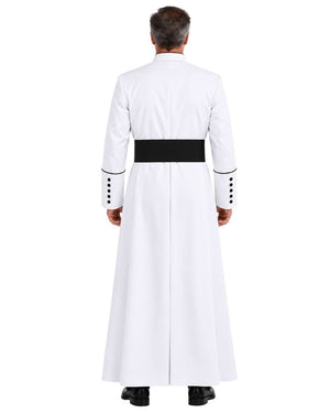 A man viewed from the back wearing a White Clergy Cassock With Black Trim with a wide black waist band, black cuff buttons, and black shoes, on a plain white studio background.