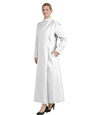 A woman modeling a long, white, high-neck, long-sleeved robe with a front button closure and side pockets, paired with black heels, against a plain white background.