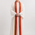 Women wearing a white robe with red and gold accents on a white background