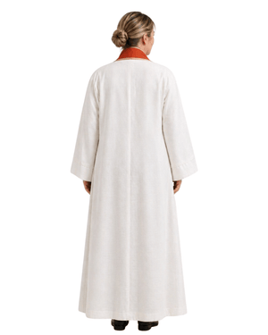 A woman viewed from the back wearing a long white robe with a contrasting red collar, set against a plain white background.
